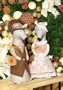 Pair of decorative toy mice dressed in a frock coat and elegant dress on the eve of the rat year. New Year celebration concept, 2020 symbol.