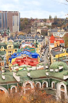 Beautiful architecture of buildings and roofs of the old Podil district of Kiev city after restoration, top view, vertical for social networks.