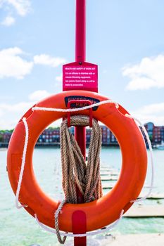 Lifebouy on post at Preston Docks in a sunny day UK