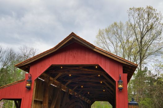 Restored Burr Arch Covered Bridge as Seen on a Spring Day