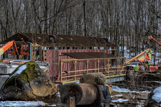 Restoring Burr Arch Covered Bridge as Seen on a Spring Day