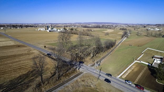 Aerial View of Amish Farmlands by Rail Road Tracks