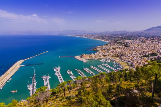 The waters of the Mediterranean bathe the moorings of this Sicilian port