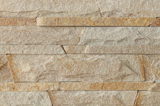 Wall stone mosaic made of sandstone texture