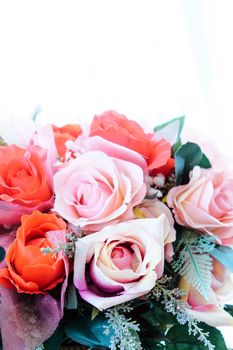 Floral background. artificial flowers in a colorful