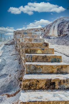 Stone steps carved into boulders in Aruba
