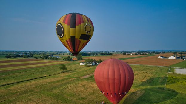 Aerial View of Hot Air Balloons Trying to Launch in a Wind as Seen by a Drone