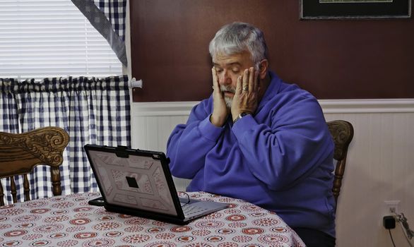 Senior Citizen Upset and Mad at Using a Computer and Technology Senior Citizen Upset and Mad at Using a Computer and Technology