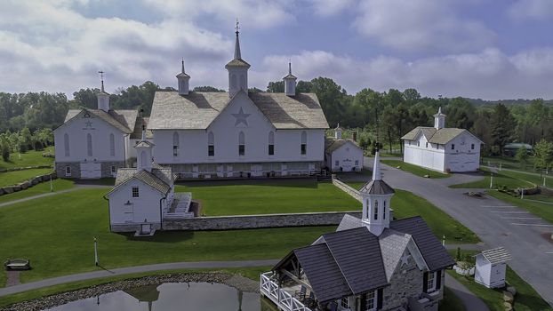 Aerial View of a Old Barns with Steeple or Cupola as Seen by a Drone Aerial View of a Old Barns with Steeple or Cupola as Seen by a Drone