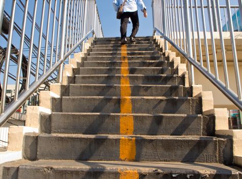 Yellow line on Concrete Stair of Overpass