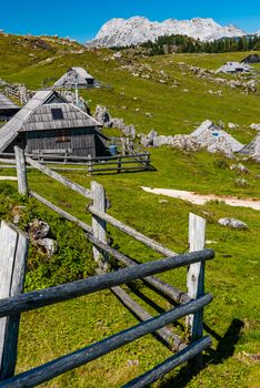 Velika Planina or Big Pasture Plateau in Slovenia. Traditional Alpine Wooden Village and Pasture.