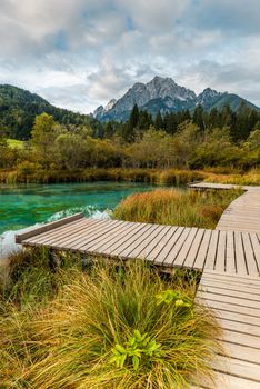 Emerald Waters in Alpine Lake at Zelenci. Pristine Landscape at Fall Season.
