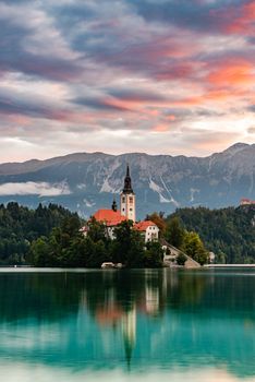 Bled Lake in Slovenia with Church on Island at Sunrise. Slovenia Top Romantic Travel Destination.