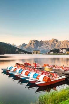 Beautiful Colorful Boats at Lake Misurina in Italian Dolomites at Sunrise.