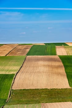 Agriculture at Spring. Colorful Patterns of Farmfields.