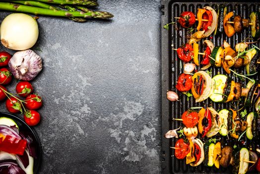 Grilled Vegetable Skewers with Herbs and Spices. Top View. border Background with Copy Space