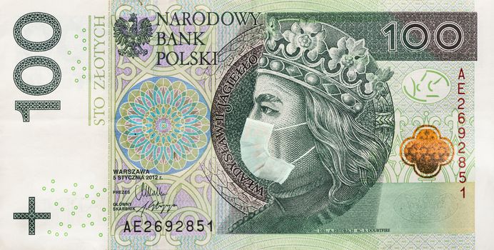 Coronavirus in Poland. Global recession. 100 Polish zloty banknote with a face mask . Polsh economy hit by corona virus covid19 outbreak.