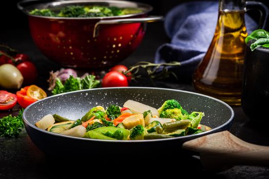 Stir Fry Fresh Vegetables Mix on Frying Pan. Dark Tones Black Image. Healthy Eating Ideas.