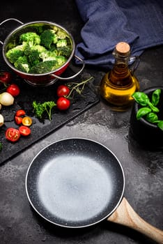 Empty Pan on Kitchen Counter and Fresh Vegetables. Product or Dish Placement Template.