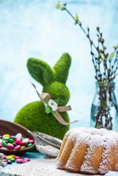 Easter Holiday Cake with Decoration on Festive Table.