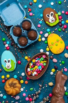 Easter Sweet Food. Easter Chocolate Egg and Bunny. Easter Holiday Table. Top Down View