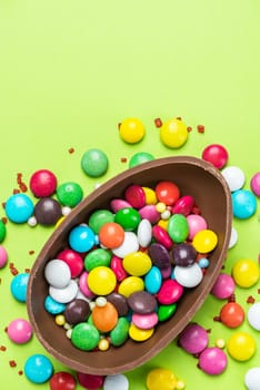 Easter Egg with Colorful Candy. Easter Background with Copy Space.