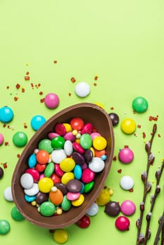 Easter Egg with Colorful Candy. Easter Background with Copy Space.
