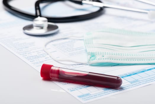 Blood Test Samples for Presence of Coronavirus (COVID-19) Tube Containing a Blood Sample from Patient.