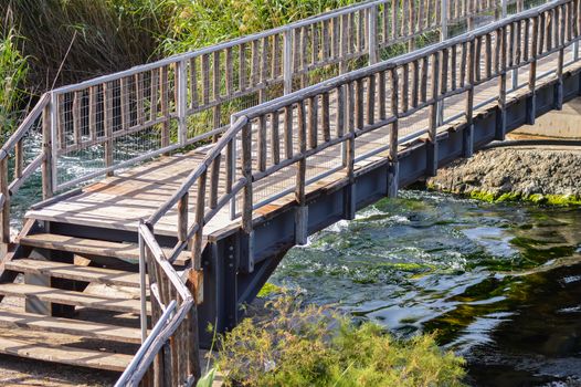 Wooden bridge over a river near amoudara on the crete island in greece