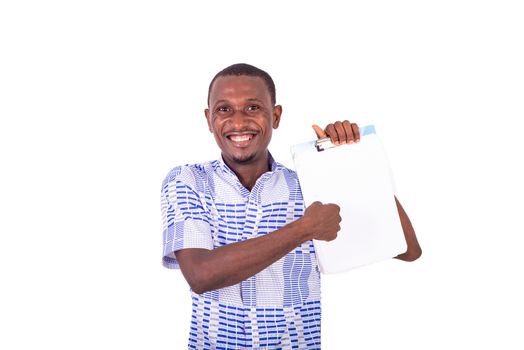 happy young man holding a clipboard and smiling at the camera.