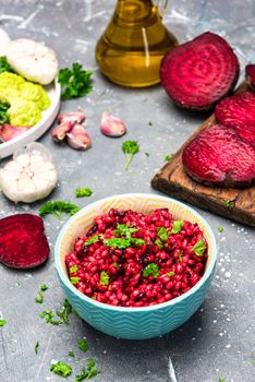 Cooking Vegetarian Plant Based Food. Buckwheat Groats with Beetroot and Parsley.