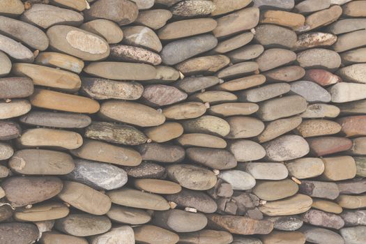 Photograph of a rounded river rocks background