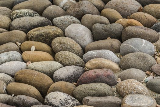 Photograph of a rounded river rocks background