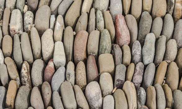 Photograph of a rounded river rocks background