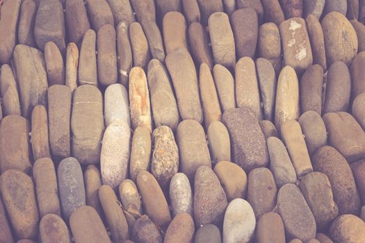 Photograph of a rounded river rocks background