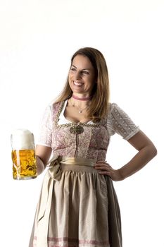 bavarian woman in a dirndl with beer