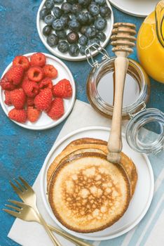 Overhead View on Healthy Brunch with Pancakes and Fruits.