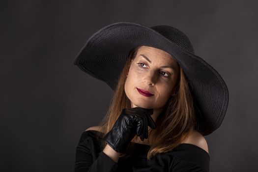 woman with a black hat