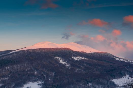 Sunrise over Polonyna Wetlinska and Carynska in Carpathian Mountains. Bieszczady, Poland at Winter Season.