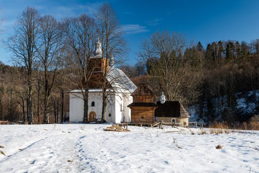 Exterior of Lopienka Orthodox Church.  Bieszczady Architecture in Winter. Carpathia Region in Poland.