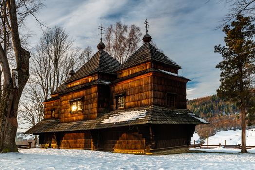 Exterior of Smolnik Wooden Orthodox Church.  Bieszczady Architecture in Winter. Carpathia Region in Poland.