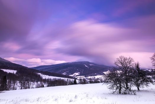 Pastel Pink Sunrise over Bieszczady Mountains in Poland. Long Exposure Photo. Panoramic View.