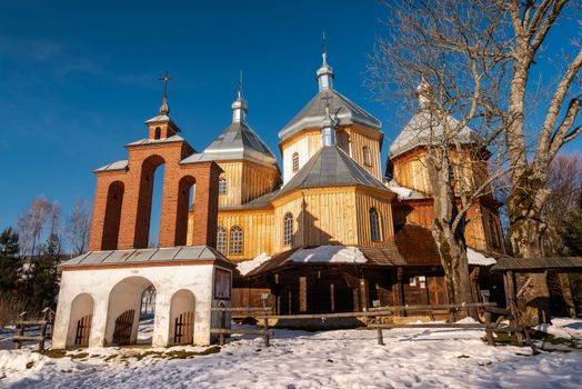 Exterior of Bystre Wooden Orthodox Church.  Bieszczady Architecture in Winter. Carpathia Region in Poland.