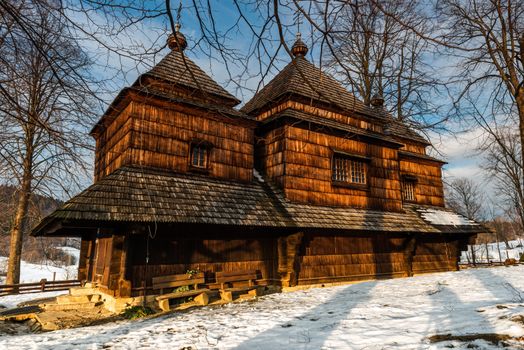 Exterior of Smolnik Wooden Orthodox Church.  Bieszczady Architecture in Winter. Carpathia Region in Poland.