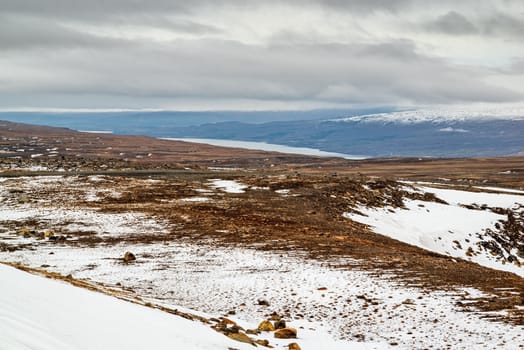 High panoramic view of the Lagarfljot river and mountains in a winter day, Iceland