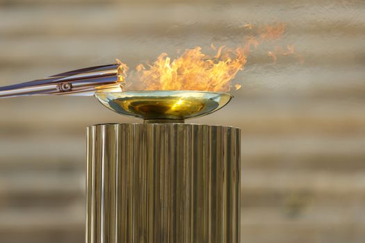 Athens, Greece - March 19, 2020: Olympic Flame handover ceremony for the Tokyo 2020 Summer Olympic Games at the Panathenaic Kallimarmaro Stadium