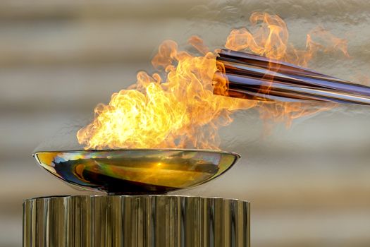 Athens, Greece - March 19, 2020: Olympic Flame handover ceremony for the Tokyo 2020 Summer Olympic Games at the Panathenaic Kallimarmaro Stadium