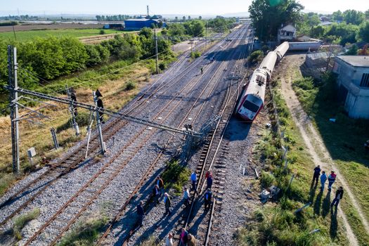 Thessaloniki, Greece - May 14, 2017: Train accident at Adendro, almost 40km west of Thessaloniki, with two confirmed dead among the passengers. The train crashed into a house after derailing.