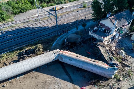 Thessaloniki, Greece - May 14, 2017: Train accident at Adendro, almost 40km west of Thessaloniki, with two confirmed dead among the passengers. The train crashed into a house after derailing.