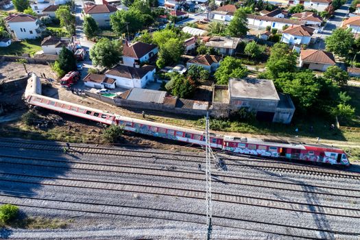 Thessaloniki, Greece - May 14, 2017: Train accident at Adendro, almost 40km west of Thessaloniki, with two confirmed dead among the passengers. The train crashed into a house after derailing.